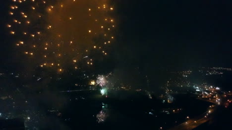 drone footage of fireworks  high above a highway