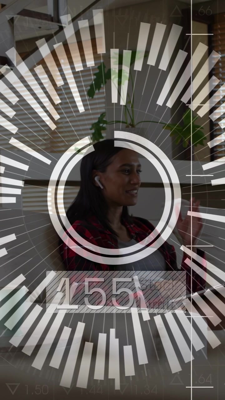 Vertical video: Woman on couch tapping phone starting tech HUD over her, readout cycling for health