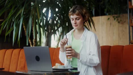 woman working at a cafe