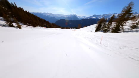 Slopes-At-Les-Marecottes-Ski-Resort-Surrounded-With-Green-Pine-Trees-In-Valais,-Switzerland