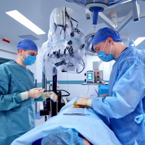 medical team of surgeons in hospital
