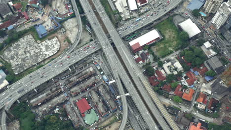 aerial shot of traffic driving on busy expressway in kuala lumpur, malaysia