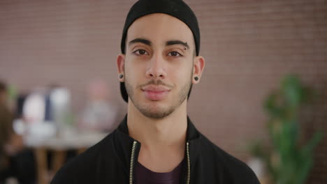 portrait of attractive young hispanic man smiling happy successful student looking confident enjoying independent lifestyle real people series