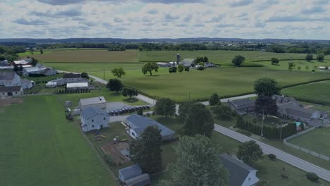 aerial view of an amish sunday church meeting on a sunny summer day