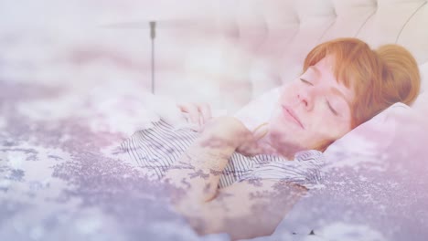 Animation-of-woman-blowing-her-nose-in-bed-against-winter-scenery