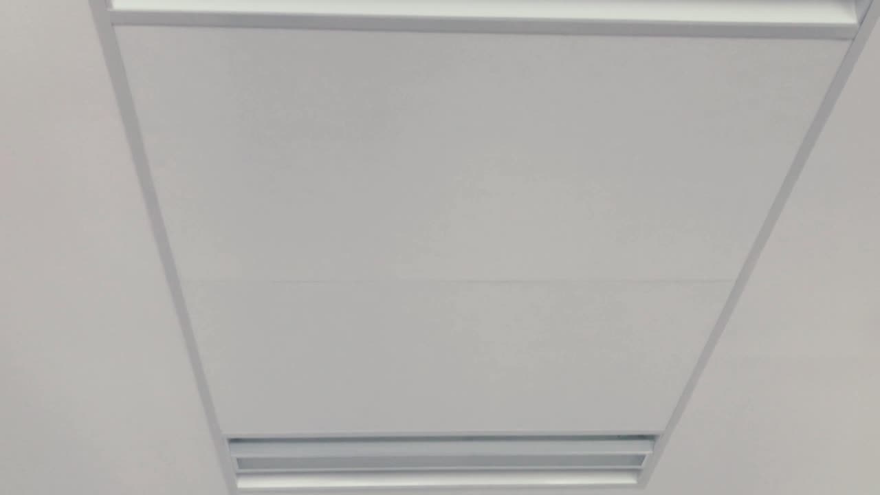 View of bright ceiling with energy-saving lighting, Modern office with white ceiling and nice design