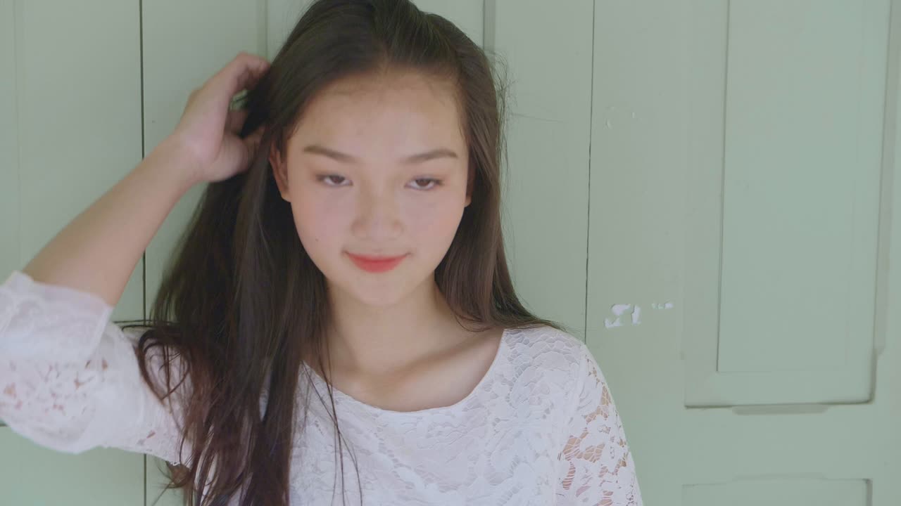 Teen Asian Girl Pose In Front Of Door, Slow Motion