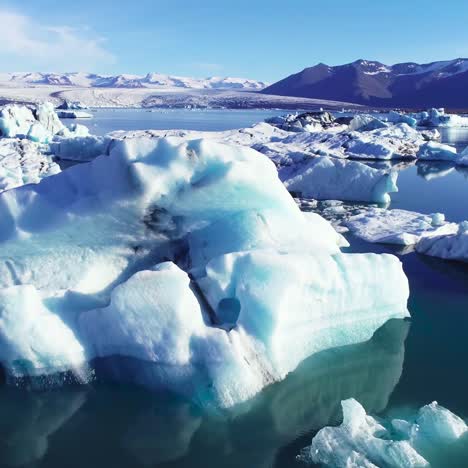 Beautiful-aerial-over-icebergs-in-the-Arctic-Jokulsarlon-glacier-lagoon-in-Iceland-8