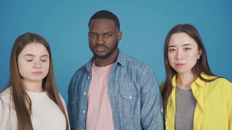 Close-up portrait of three multiethnic people. Different race and ethnicity concept.