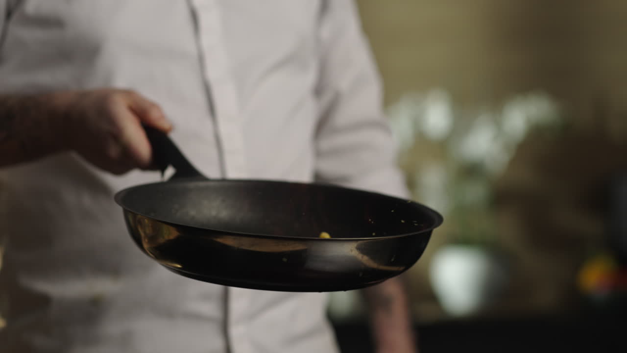 Cooking food in a frying pan