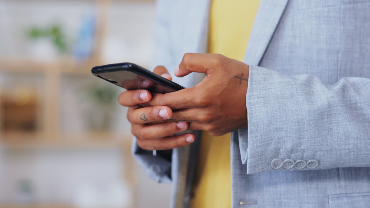 Closeup, man and hands with smartphone in office