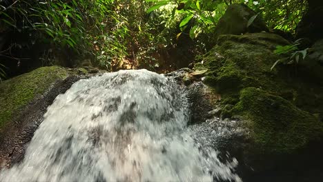 A-small-waterfall-located-in-Khao-Laem-National-Park,-gathers-enough-water-creating-a-small-pool-in-which-birds-and-animals-come-to-drink-water-in-the-morning-and-before-dark