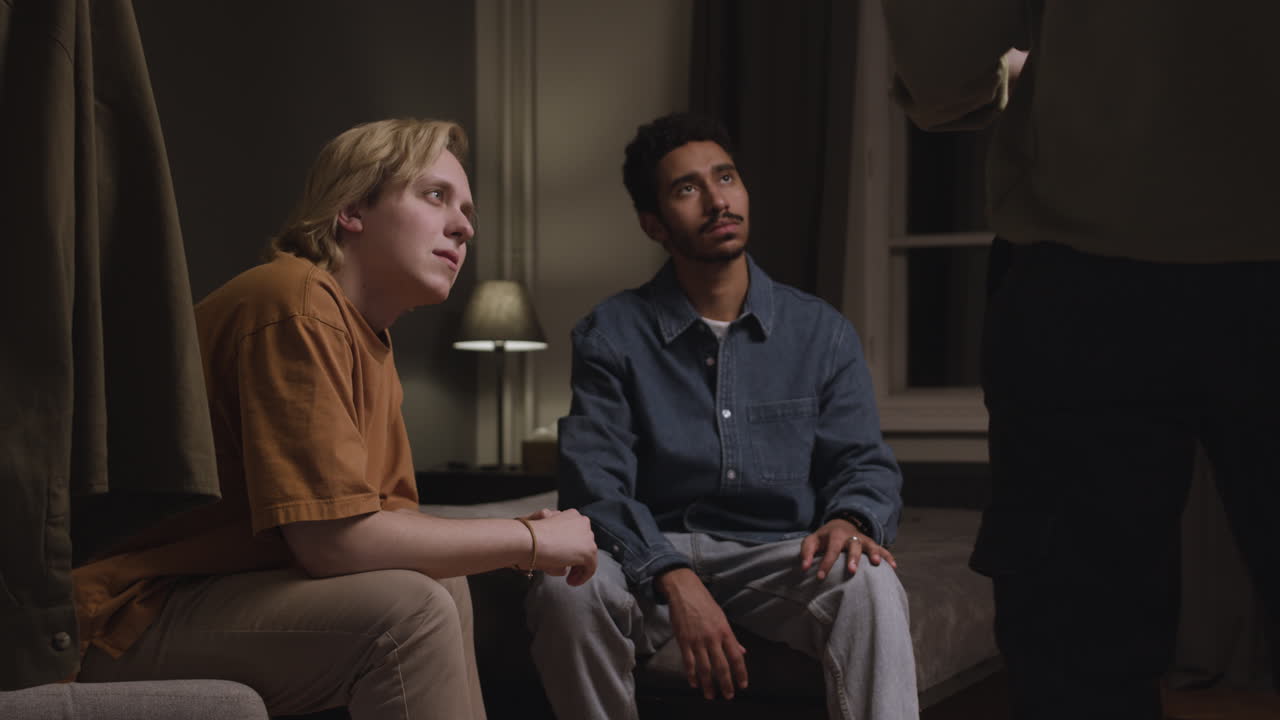 Meeting of male friends in an apartment