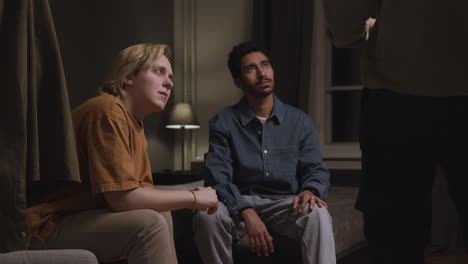 meeting of male friends in an apartment