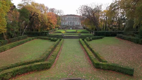 slow establishing shot of engarran castle with private gardens in laverune