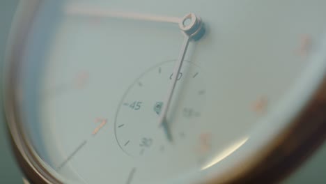 extreme close-up view of men‘s wristwatch mechanical clock.