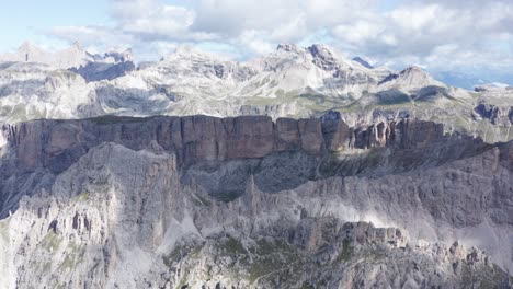 drone shot moving foward, aerial shot of dolomites landmark tre cime