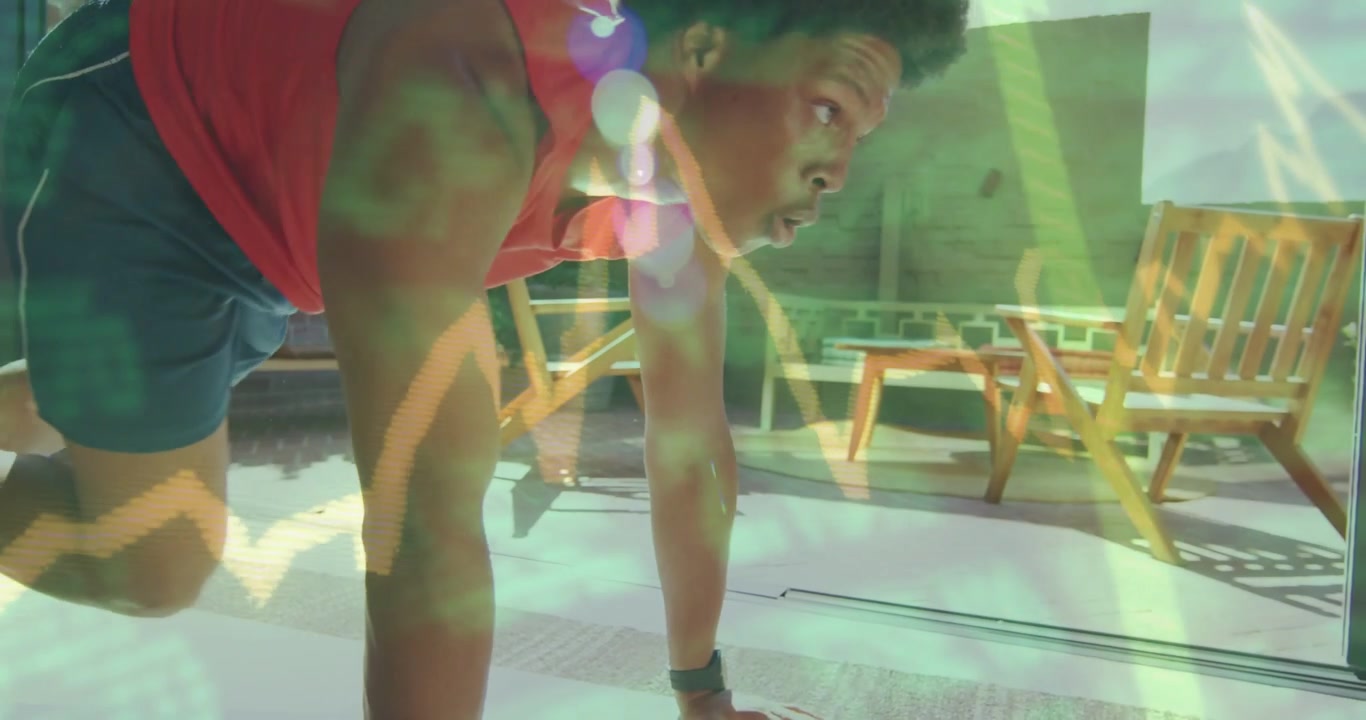 Man starting from plank and driving alternating knees for fitness on patio, ECG line over chest