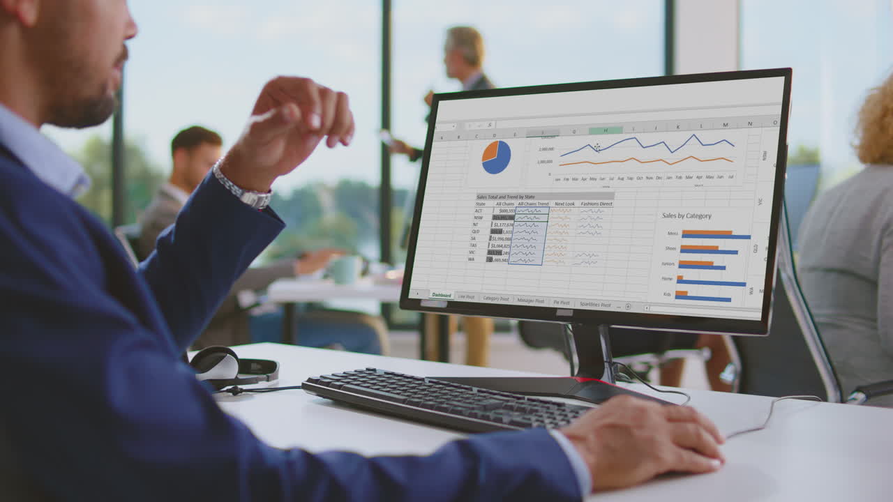 Business People Working on Data Analysis in Office