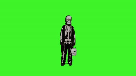 toma completa de un niño vestido con un disfraz de esqueleto llamando a la puerta truco o trato en halloween sosteniendo un cubo en forma de calabaza jack o'lantern contra la pantalla verde del estudio