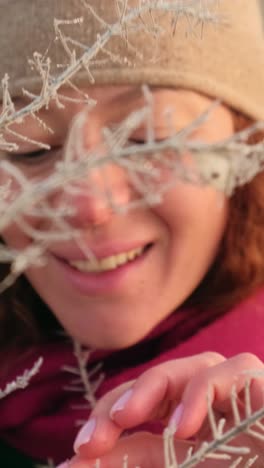 woman smiling outdoors in winter