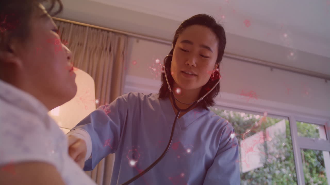 Nurse examining patient in healthcare room, showing animated stethoscope graphic and heart icon