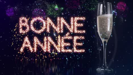 animation of happy new year text greetings over glass of champagne and fireworks