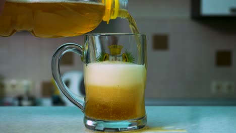 pouring beer into a glass