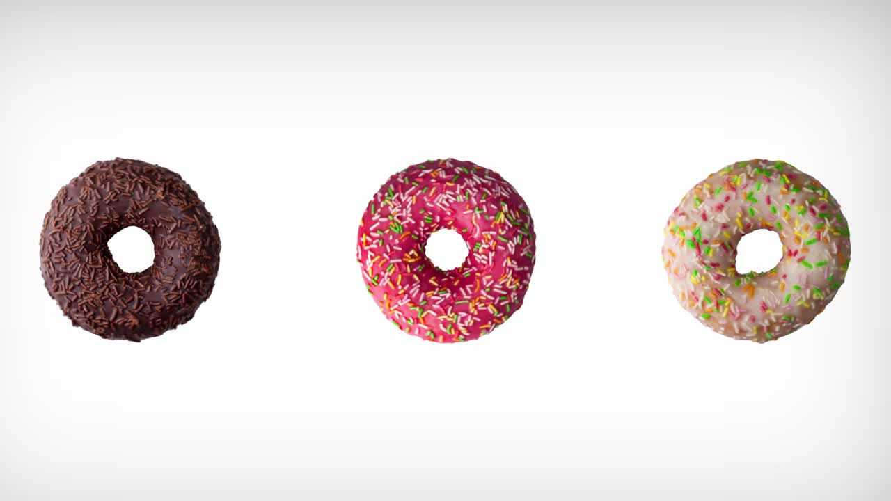 animación de rotación abstracta de tres rosquillas de colores diferentes en un fondo blanco.