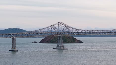 The Richmond–San Rafael Bridge is captured from the sky, revealing both its architectural scale and the quiet rhythm of bay traffic.