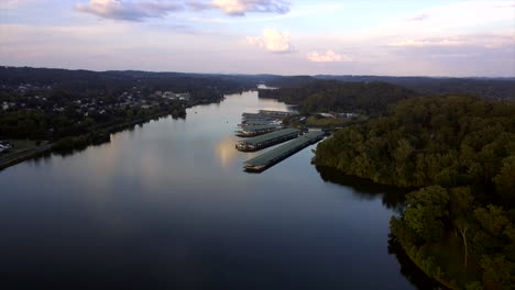 flying away from a marina on the tennessee river at dusk