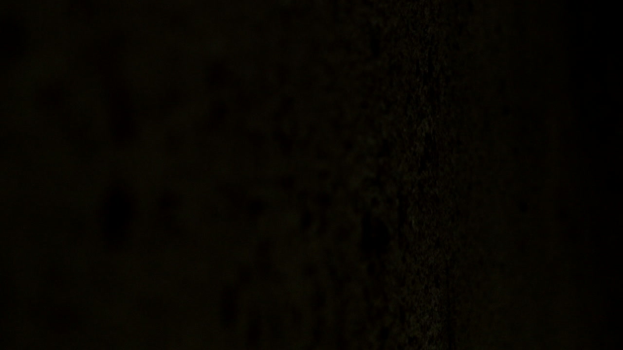 Shadow of Garage Door Moving Over Concrete Floor VERTICLE SLIDE RIGHT