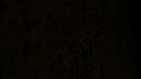 shadow of garage door moving over concrete floor verticle slide right