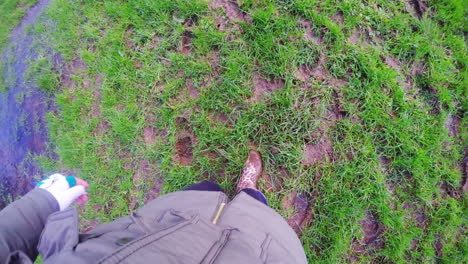 Woman-filming-her-steps-on-the-grass