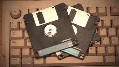 floppy disks on a vintage keyboard