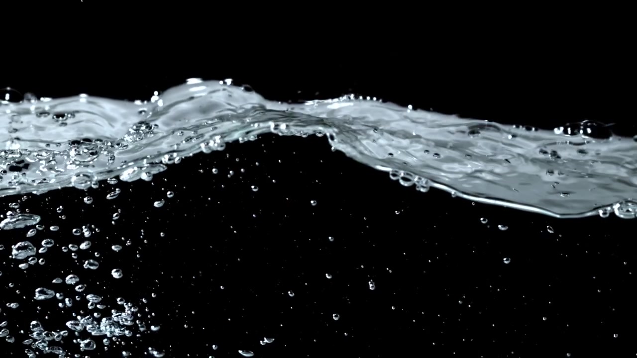 Clear Water Splashing and Bubbling on a Black Background