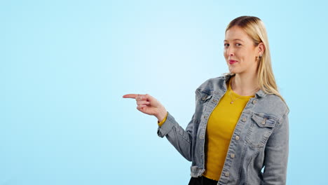 Happy-woman,-face-and-advertising-choice-in-studio