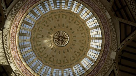 central valencia marketplace dome, ceiling architecture, rotating low angle shot, spain