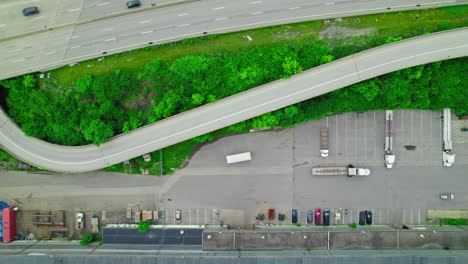 pittsburgh transportation - top down flatbed, stepdeck and conestoga trailer at shipping department in pittsburgh pennsylvania, america