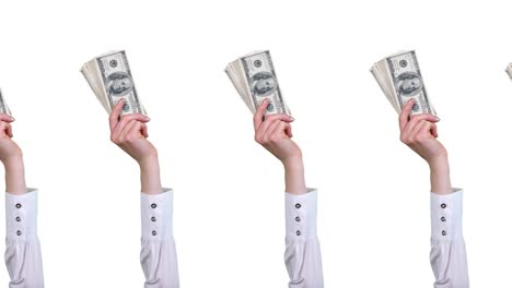 money, cash. gif animation. close-up. female hands, in white blouses, hold hundred dollar bills bundles, wave them. isolated on white background. looping seamless pattern. animation
