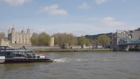 View-Of-Tower-Of-London-And-Tower-Bridge-From-Tourist-Boat-On-River-Thames-3