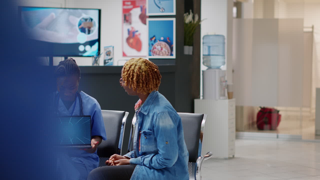 Healthcare professionals discussing brain scan results with a patient