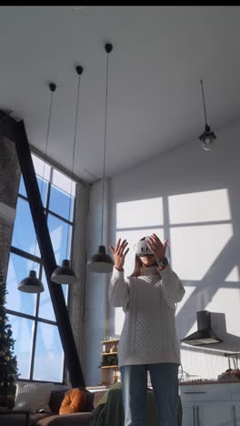 woman wearing vr headset in a modern apartment