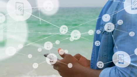 animación de la red de conexiones sobre el hombre usando el teléfono en la playa