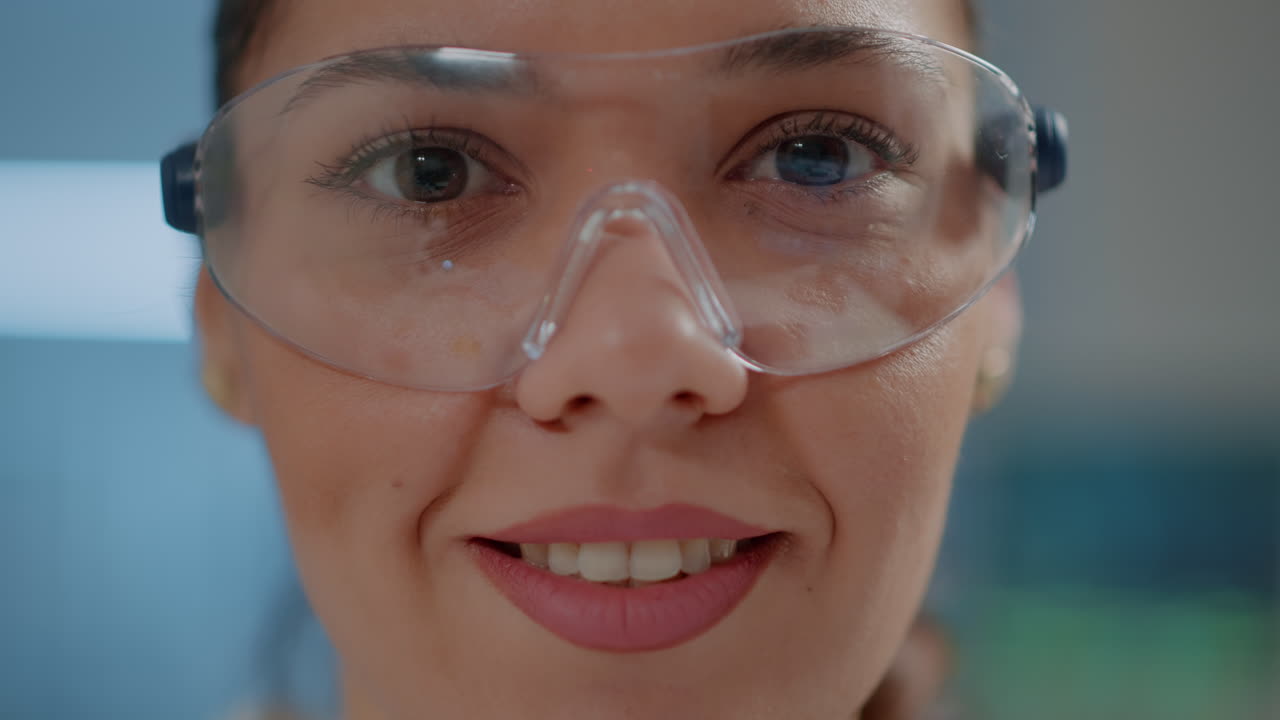 Biochemical engineer wearing protective glasses
