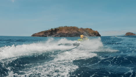 cinematic slomo shot of a jet ski going fast through waves in the philippines, asia, slow motion, cinematic