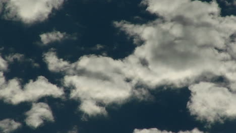 White-clouds-drift-in-a-blue-sky-in-time-lapse