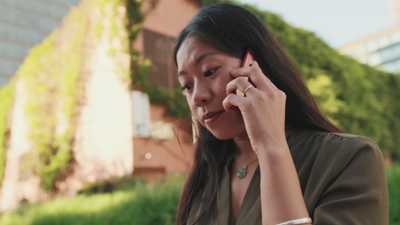 Woman on a phone call outdoors