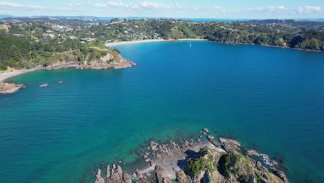 nani island in repo bay with view of palm beach in distance