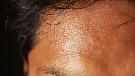 close up of a person sweating